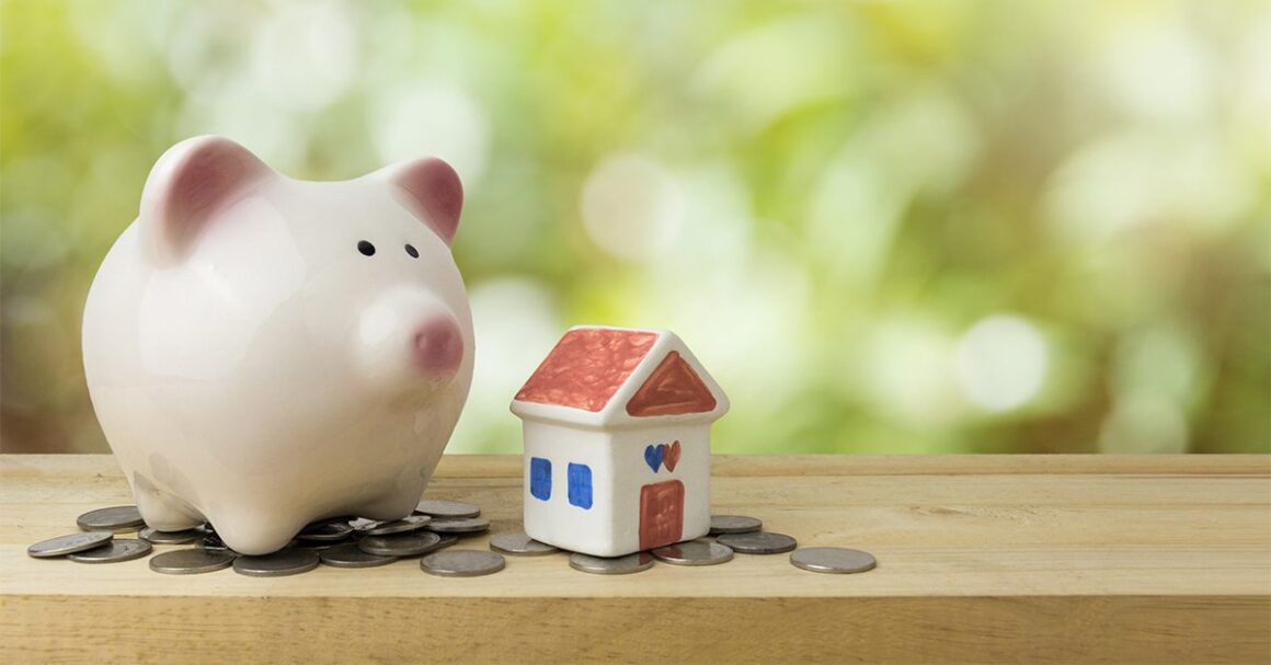 Ceramic Piggy Bank And House On A Shelf With Coins Gettyimages 951812406 1200w 628h.jpg