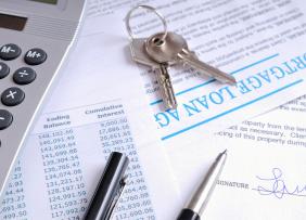 Mortgage Papers Keys Calculator Fotolia 81997172 1300w 867h.jpg